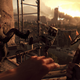 Man spartan kicks another man off a tower in Dying Light.